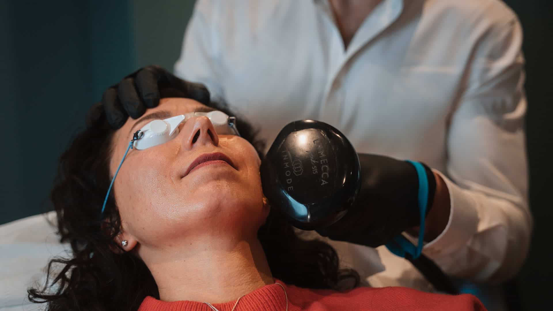 Woman receiving skin rejuvenation treatment at Cannelle Skin Clinic, professional skincare service.