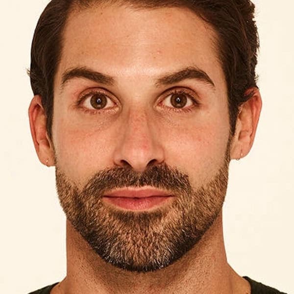 Man with clear, healthy skin after facial treatment at Cannelle Skin Clinic.