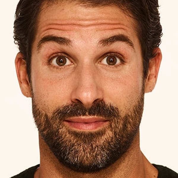 Close-up of a man with clear, healthy skin at Cannelle Skin Clinic.