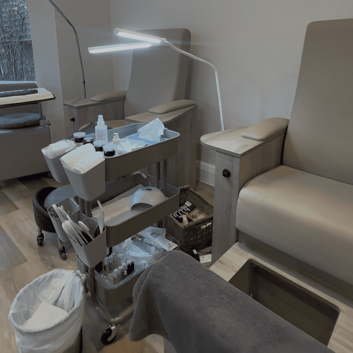 Professional skincare treatment room with medical tools and relaxing chairs at Cannelle Skin Clinic.