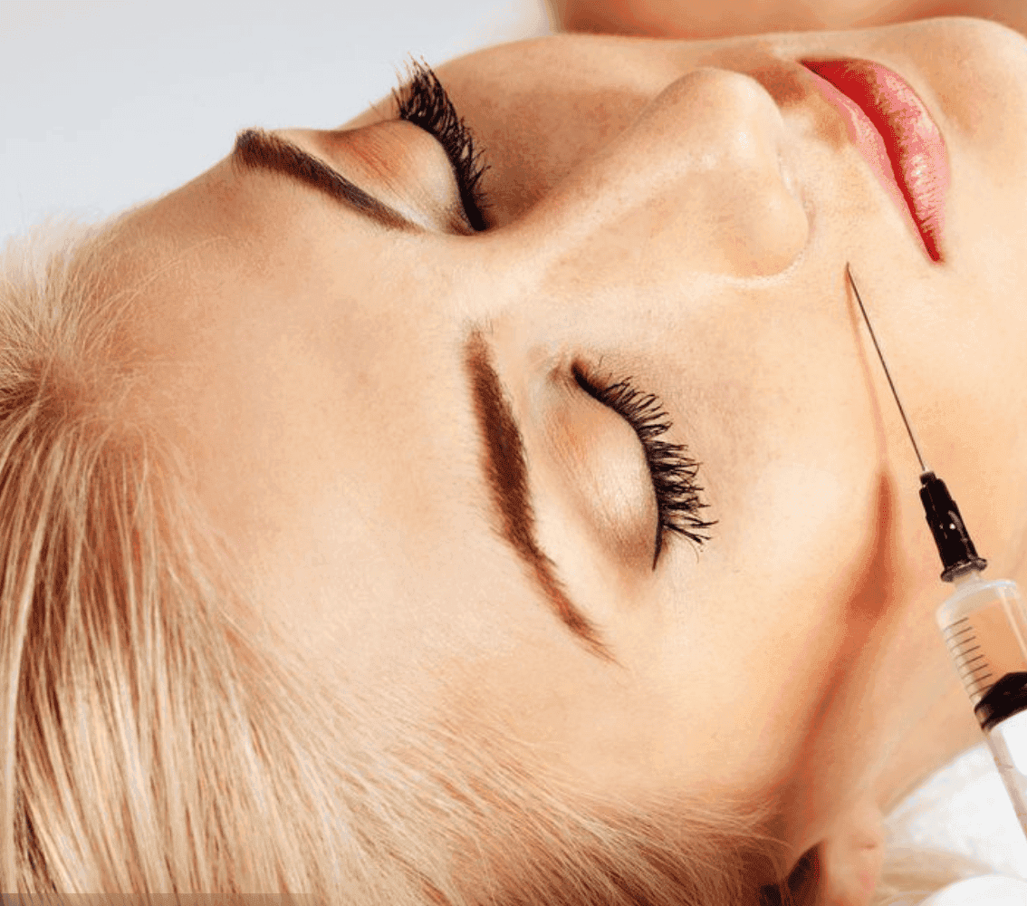 Woman receiving facial injection treatment at Cannelle Skin Clinic, skincare specialist performing c.