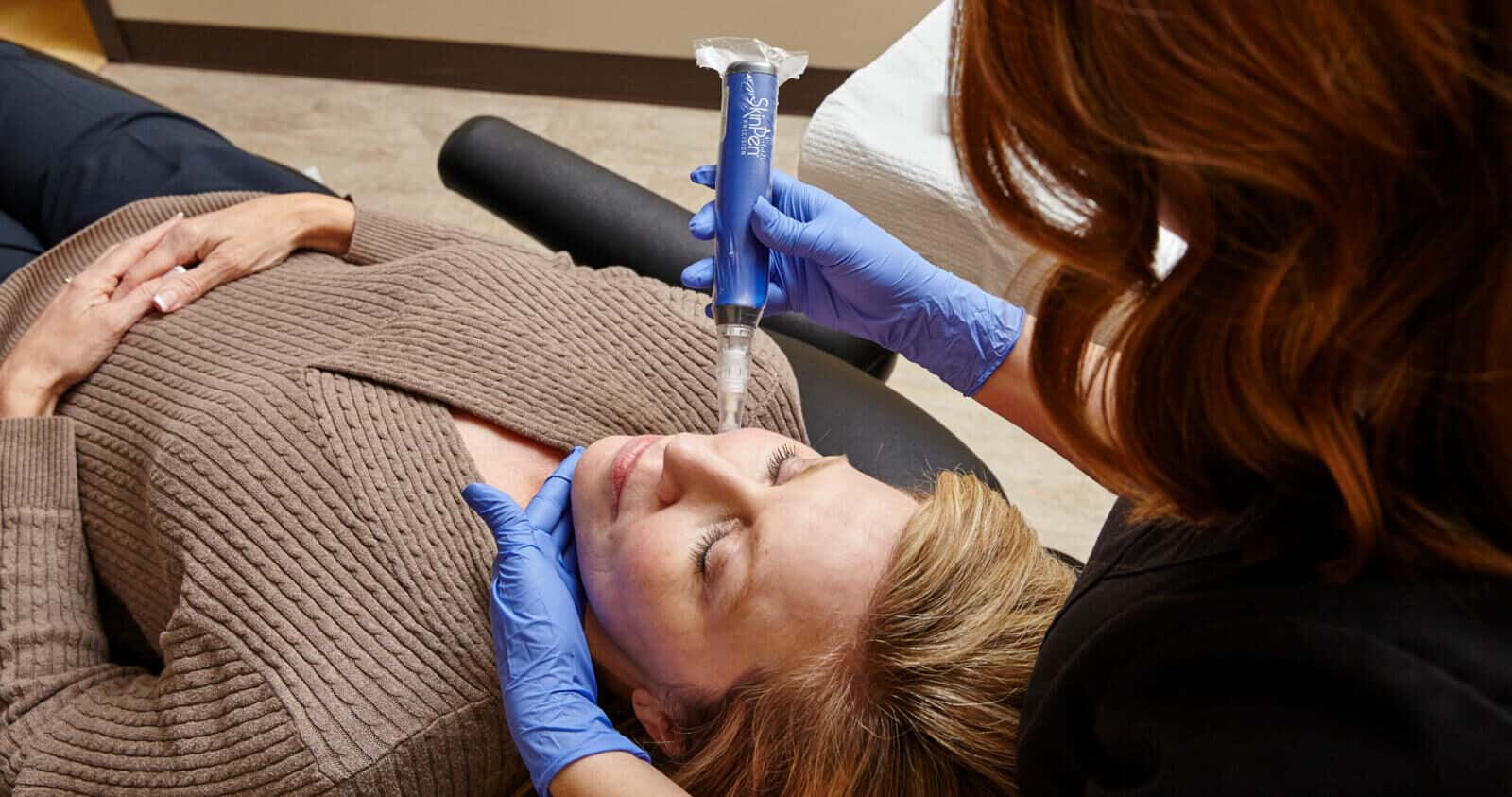 Facial injection procedure performed by a professional at Cannelle Skin Clinic, focusing on skin rej.