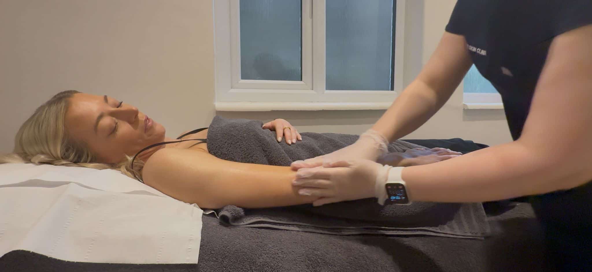 Woman receiving a professional facial treatment at Cannelle Skin Clinic, skincare specialist perform.