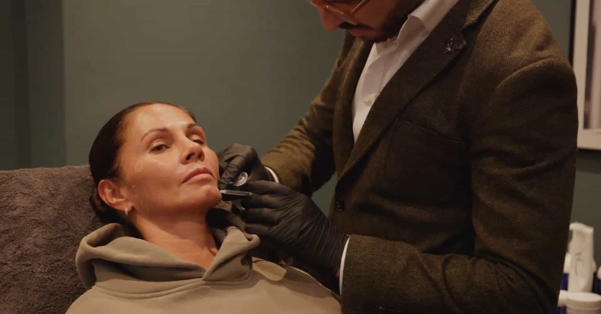 Woman receiving a facial treatment with a professional aesthetician at Cannelle Skin Clinic.