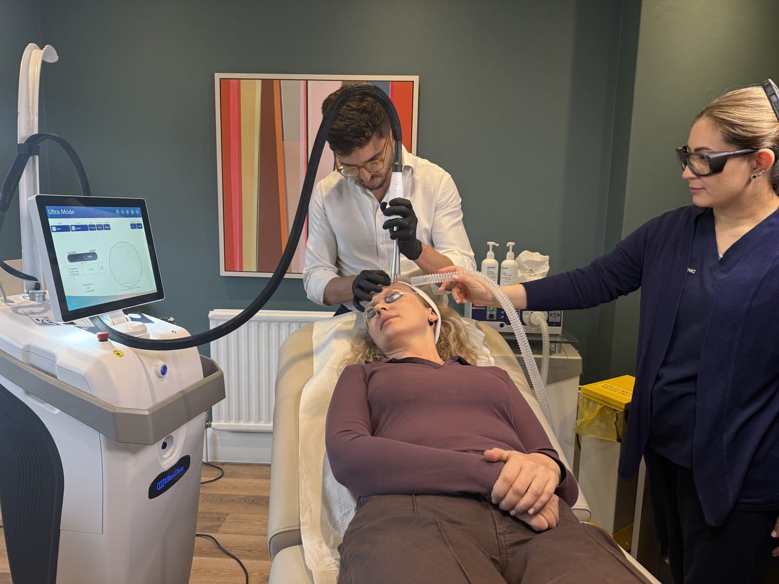 Dr Mattia Parducci performs UltraClear beside the laser at Cannelle Skin Clinic in Summertown
