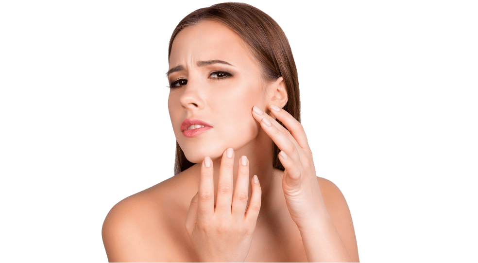 woman checking out dry skin on her face