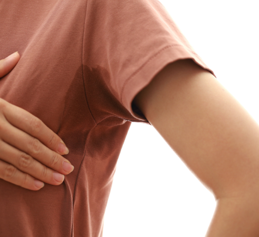 Sweating Woman with Hyperhidrosis