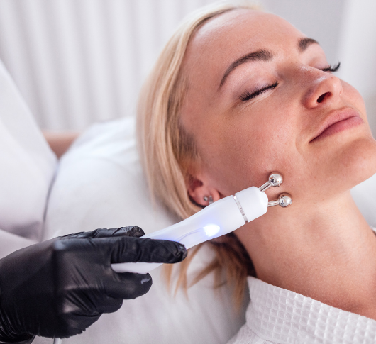 Woman enjoying a relaxing CACI facial treatment