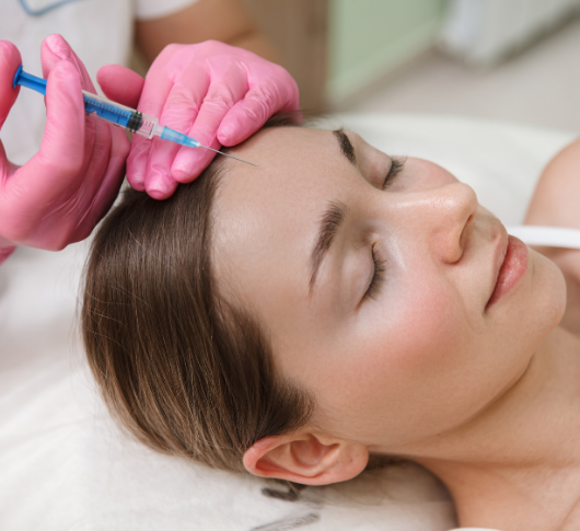 Woman receiving anti wrinkle injections treatment