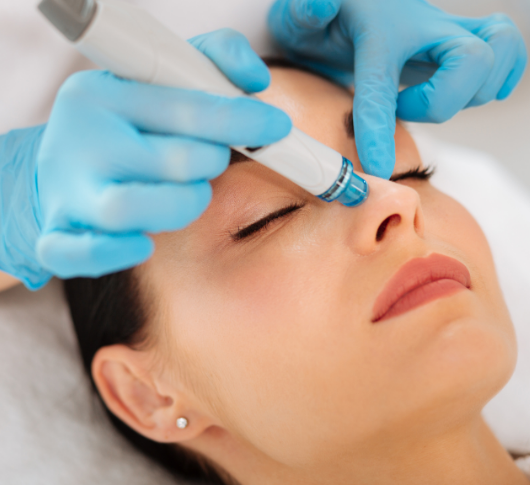 Woman undergoing HydraFacial skin procedure
